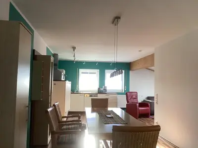 Ein Sitzbereich in der Unterkunft Ferienwohnung Gubernath