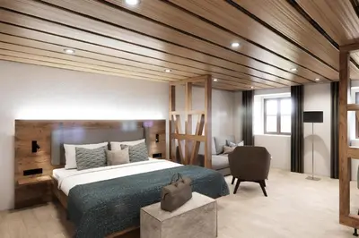 Ein Bett oder Betten in einem Zimmer der Unterkunft Apartments Alter Pfarrhof