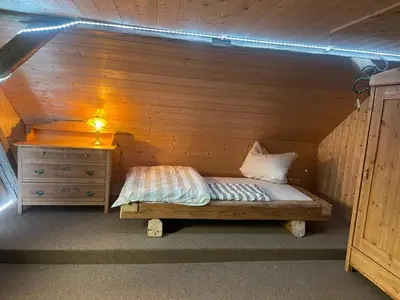 Ein Bett oder Betten in einem Zimmer der Unterkunft Ferienhaus Linde