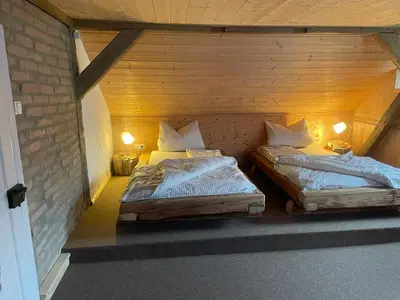 Ein Bett oder Betten in einem Zimmer der Unterkunft Ferienhaus Linde