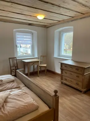 Ein Bett oder Betten in einem Zimmer der Unterkunft Ferienhaus Linde