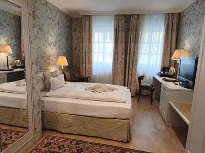 Ein Bett oder Betten in einem Zimmer der Unterkunft Hotel Goldener Anker
