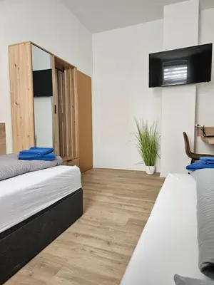 Ein Bett oder Betten in einem Zimmer der Unterkunft Westend 2