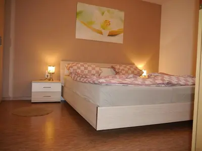 Ein Bett oder Betten in einem Zimmer der Unterkunft Gästehaus Seeber
