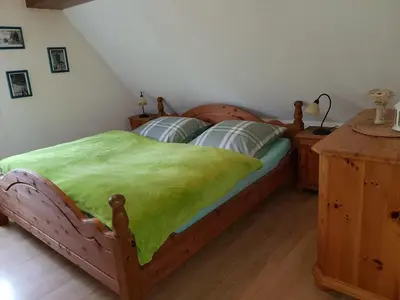 Ein Bett oder Betten in einem Zimmer der Unterkunft Ferienwohnung Grenzblick