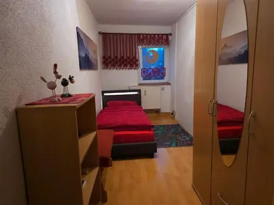 Ein Bett oder Betten in einem Zimmer der Unterkunft Ferienwohnung Grenzblick