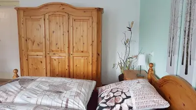 Ein Bett oder Betten in einem Zimmer der Unterkunft Ferienwohnung Grenzblick
