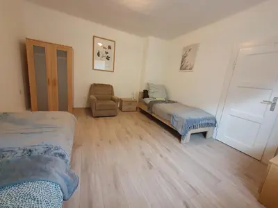 Ein Bett oder Betten in einem Zimmer der Unterkunft Arzberger Monteurhaus
