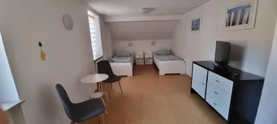 Ein Bett oder Betten in einem Zimmer der Unterkunft Arzberger Monteurhaus