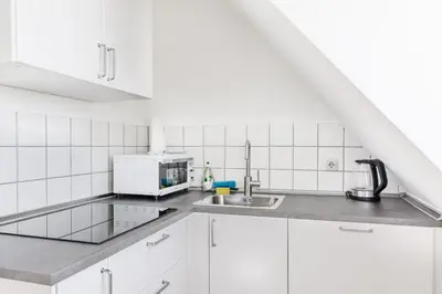 Küche/Küchenzeile in der Unterkunft Zentrales charmantes Apartment
