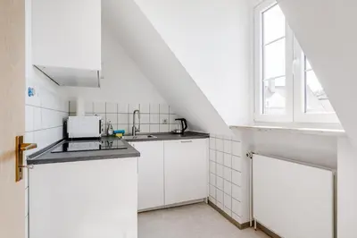 Küche/Küchenzeile in der Unterkunft Zentrales charmantes Apartment