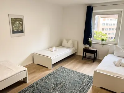 Ein Bett oder Betten in einem Zimmer der Unterkunft Zentrale Apartments in Bayreuth