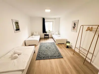 Ein Bett oder Betten in einem Zimmer der Unterkunft Zentrale Apartments in Bayreuth