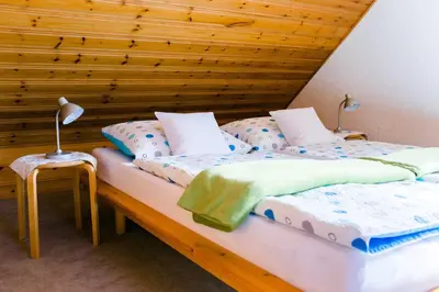 Ein Bett oder Betten in einem Zimmer der Unterkunft Haus Christof