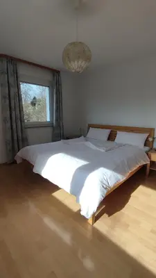 Ein Bett oder Betten in einem Zimmer der Unterkunft Ferienwohnung Familie Haas