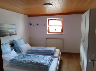 Ein Bett oder Betten in einem Zimmer der Unterkunft Ferienwohnung Rackl