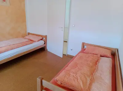Ein Bett oder Betten in einem Zimmer der Unterkunft Ferienwohnung Rackl
