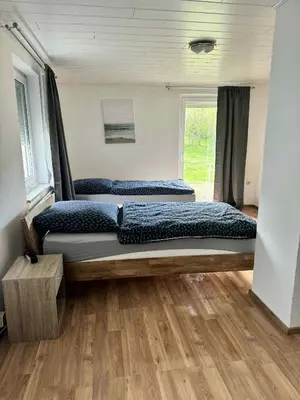 Ein Bett oder Betten in einem Zimmer der Unterkunft Monteurwohnung Naila