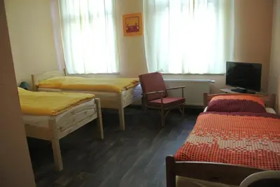 Ein Bett oder Betten in einem Zimmer der Unterkunft Pension Valeria
