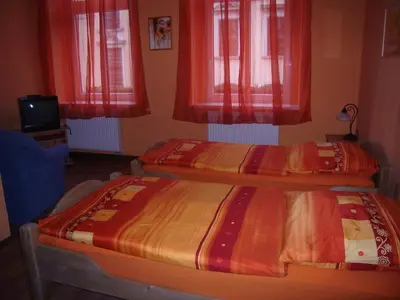 Ein Bett oder Betten in einem Zimmer der Unterkunft Pension Valeria