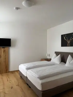 Ein Bett oder Betten in einem Zimmer der Unterkunft Gasthof zur Burgruine