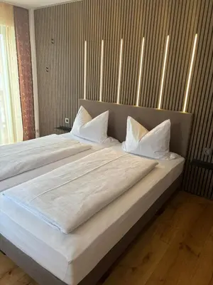 Ein Bett oder Betten in einem Zimmer der Unterkunft Gasthof zur Burgruine