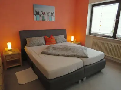 Ein Bett oder Betten in einem Zimmer der Unterkunft Ferienwohnung Mia
