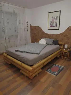 Ein Bett oder Betten in einem Zimmer der Unterkunft Ferienwohnung Mia