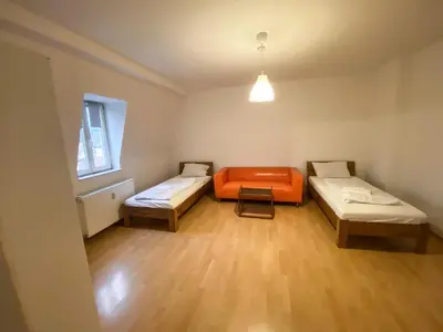 Ein Bett oder Betten in einem Zimmer der Unterkunft Zentrale Apartments in Kulmbach- 20km bis Bayreuth