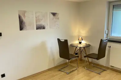 Ein Sitzbereich in der Unterkunft Shine Apartment Schwarzenfeld