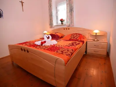Ein Bett oder Betten in einem Zimmer der Unterkunft Schönes Ferienhaus mit großem Garten bei Stadlern