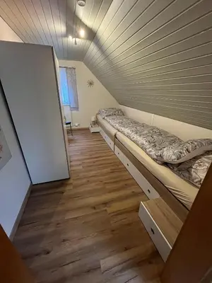 Ein Bett oder Betten in einem Zimmer der Unterkunft Ferienwohnung Emma