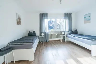 Ein Bett oder Betten in einem Zimmer der Unterkunft KU02 Apartment Monteurswohnung in Kasendorf bei Kulmbach, Bayreuth, Bamberg