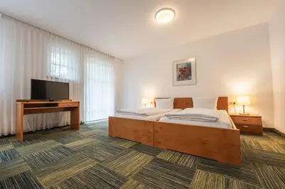 Ein Bett oder Betten in einem Zimmer der Unterkunft Ferienwohnung 4 Personen 1