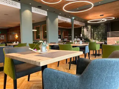 Ein Restaurant oder anderes Speiselokal in der Unterkunft Ferienwohnung 4 Personen 1