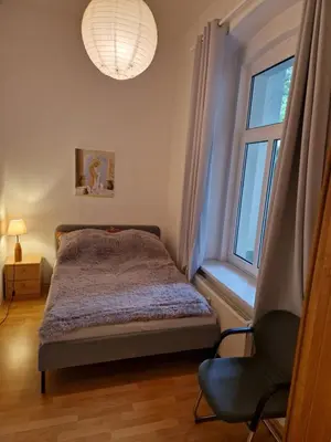 Ein Bett oder Betten in einem Zimmer der Unterkunft Ferienwohnung zum Schloss