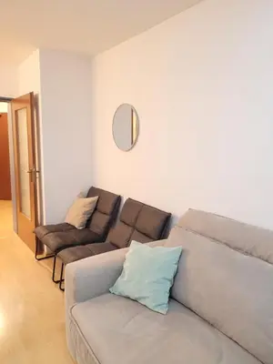 Ein Sitzbereich in der Unterkunft Zentrale 2 Zimmer-Wohnung mit Balkon