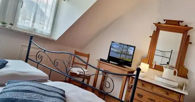 Ein Bett oder Betten in einem Zimmer der Unterkunft Ferienwohnungen Familie Fuss in Weißenstadt