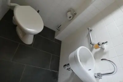 Ein Badezimmer in der Unterkunft Weisses Huhn von Moschendorf