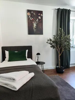Ein Bett oder Betten in einem Zimmer der Unterkunft Elias modern Lifestyle