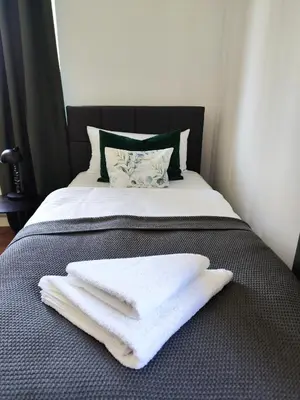 Ein Bett oder Betten in einem Zimmer der Unterkunft Elias modern Lifestyle