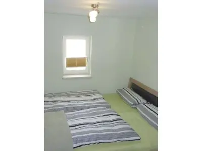 Ein Bett oder Betten in einem Zimmer der Unterkunft Paul in the holiday home Bero