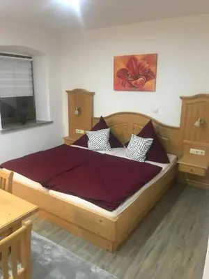 Ein Bett oder Betten in einem Zimmer der Unterkunft Zum Gogerer