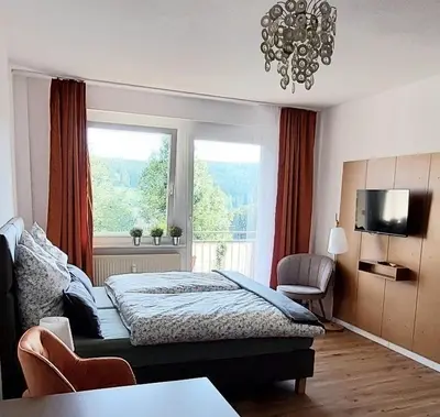 Ein Bett oder Betten in einem Zimmer der Unterkunft Sonnenbalkon