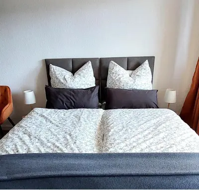 Ein Bett oder Betten in einem Zimmer der Unterkunft Sonnenbalkon