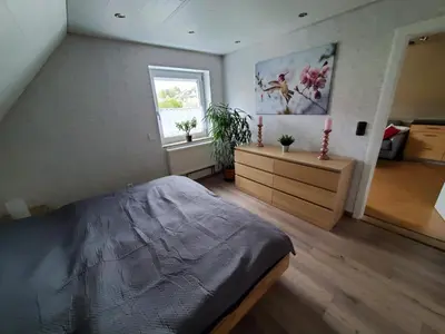 Ein Bett oder Betten in einem Zimmer der Unterkunft Schmuckstück im Fichtelgebirge