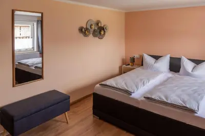 Ein Bett oder Betten in einem Zimmer der Unterkunft Familienapartment Vogtland