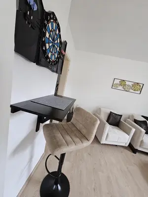 Ein Sitzbereich in der Unterkunft Timber Suite - near Rußweiher
