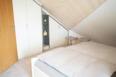 Ein Bett oder Betten in einem Zimmer der Unterkunft Ferienhaus Toni