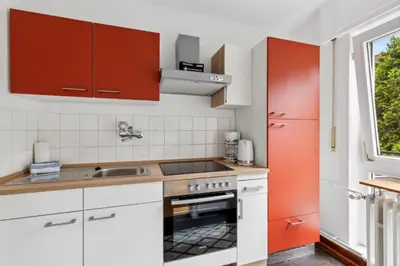 Küche/Küchenzeile in der Unterkunft Sali Homes SM13 -1-Room Apartment by Röhrensee